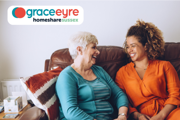 Grace Eyre Homeshare Sussex logo plus 2 women chatting on a sofa