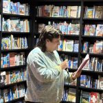 Pagane reading from the 'Elephant in the Room' book